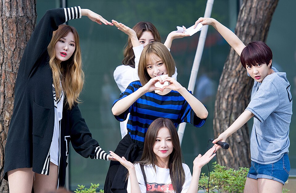 The five members of EXID at a fan meeting on Show! Music Core in July 2016, during their post-reversal peak